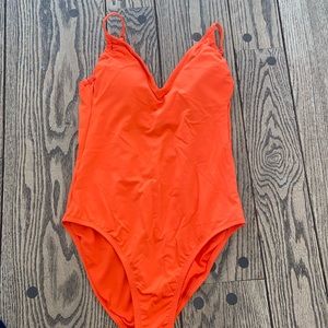 Kona Sol size small orange, one piece bathing suit